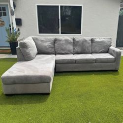 Gray Ashley HomeStores 2pc Sectional Sofa (Leftside Chaise)