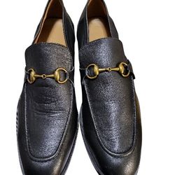 Classic Black Leather Loafers with Gold Detailing 