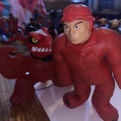 Two stretch arm toys