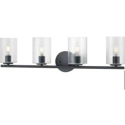 Hampton Bay
Champlain 31.5 in. 4-Light Matte Black Modern Bathroom Vanity Light with Clear Seeded Glass Shades
