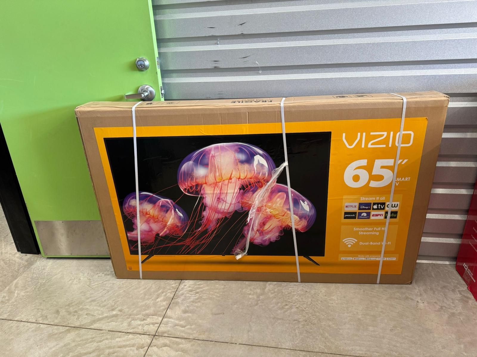 Hd390 65” Vizio smart 4k led Uhd tv floor model