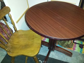 Small table and oak chair