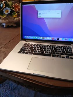 Apple .macbook pro 2.8 ghz 2015 i7 processor 16 gb ram 256 gb ssd 0s monterey very clean with charger