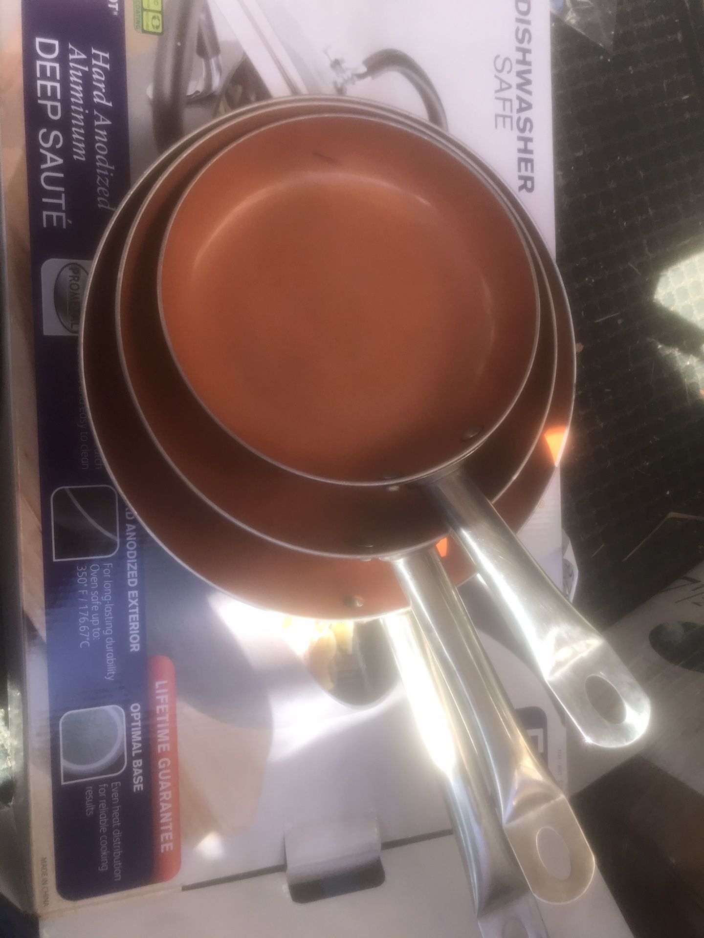 Three copper pans