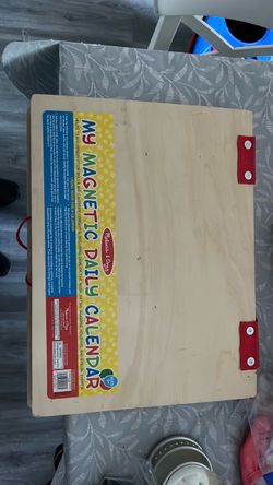 Magnetic calendar with all the pieces