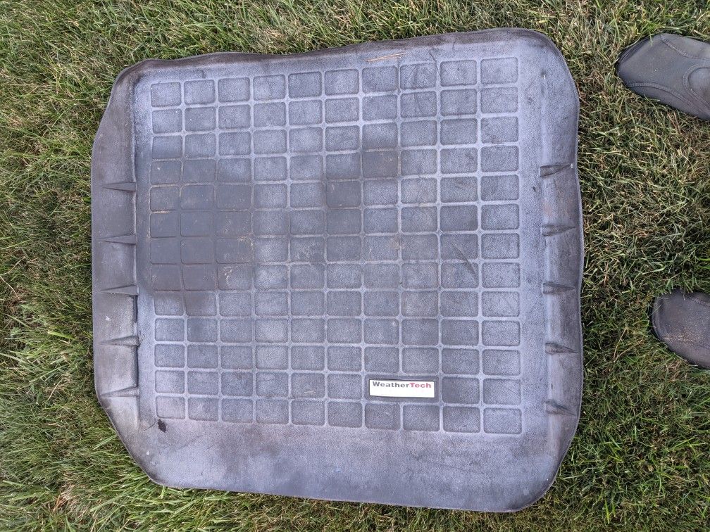 Weather Tech Mat. Both Passenger And Driver.Was In My Explorer. Fits Many Others. Raised Sides Will Hold Snow And Water.