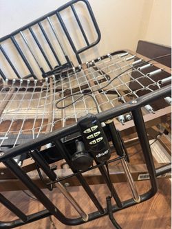 Electric bed with side rails