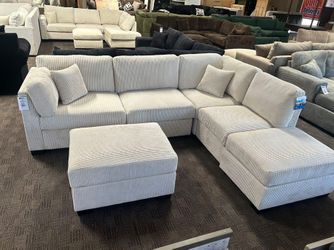 Beige corduroy 4 Pc sectional sofa set with ottoman