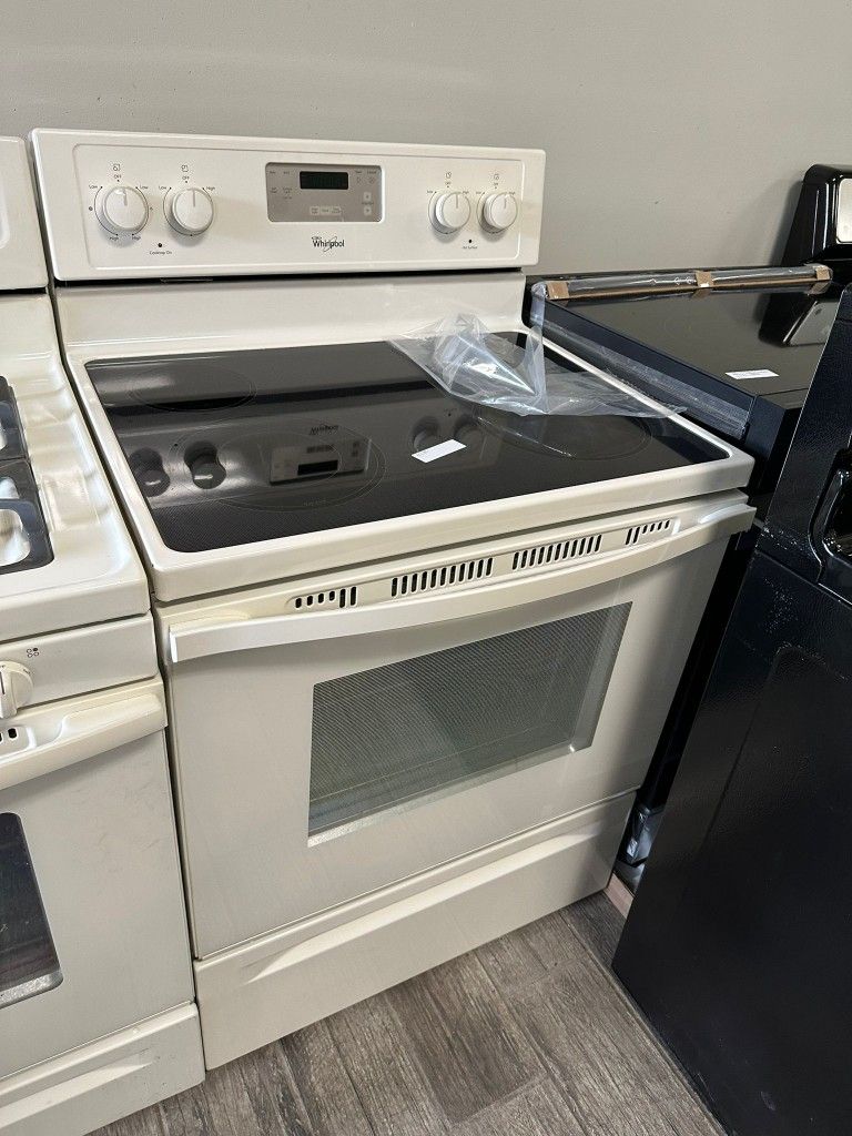 Whirlpool off white electric stove used