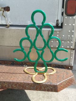 Gold and green horshoe Christmas tree statue