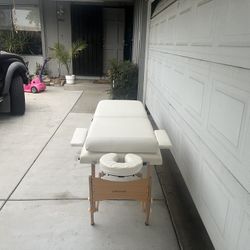 Massage table