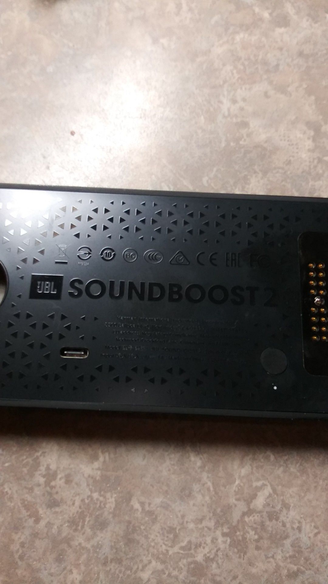 JBL Sound Boost2 speaker for a Moto22 phone.