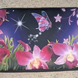 Neoprene butterfly and flower laptop case with hidden handle.