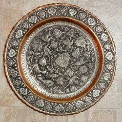 Antique Persian copper plate w/Copper with silver, pewter or tin overlay, likely dating back to the Qajar period.
Material: Copper with silver, pewter