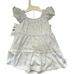  baby dress with blue and yellow floral pattern. Features ruffled sleeves and tiered design.