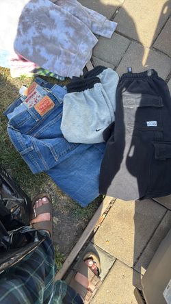 Two Pairs Of Levi’s A Pair Of True Religions, A Large Pair Of Nike Shorts And A Medium Pro Club Sweat Sweats