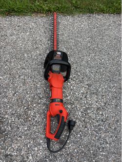 Electric hedge trimmer. Like new. Used briefly. Works perfectly.