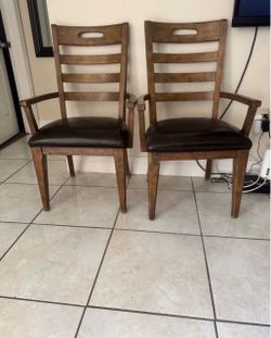 Pair Of Solid Wood Arm Chairs