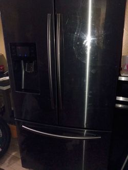 Black French Door Refrigerator with Ice Dispenser