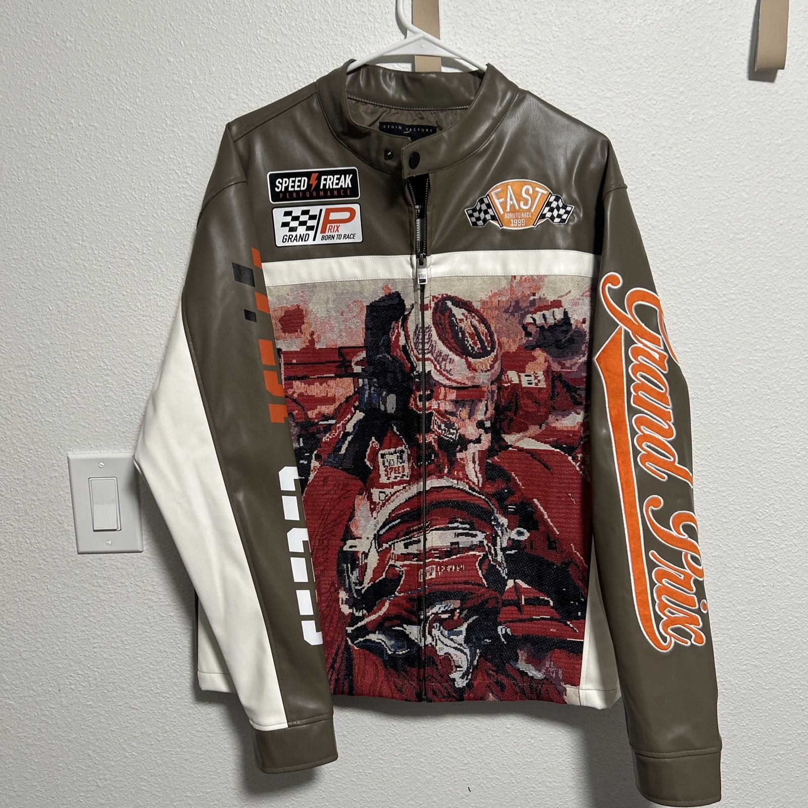 Copper Rivet racing-style jacket. Brand New With Tag Size M Send Offers