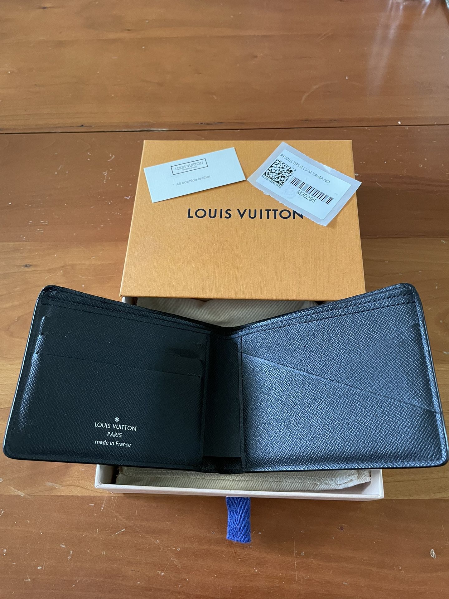 Louis Vuitton Taiga Leather Wallet for Sale in Irvine, CA - OfferUp