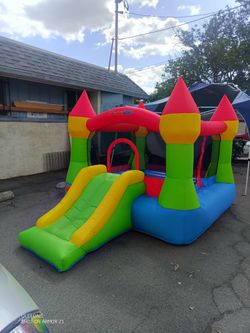 Bounceland Inflatable Bounce House with Slide