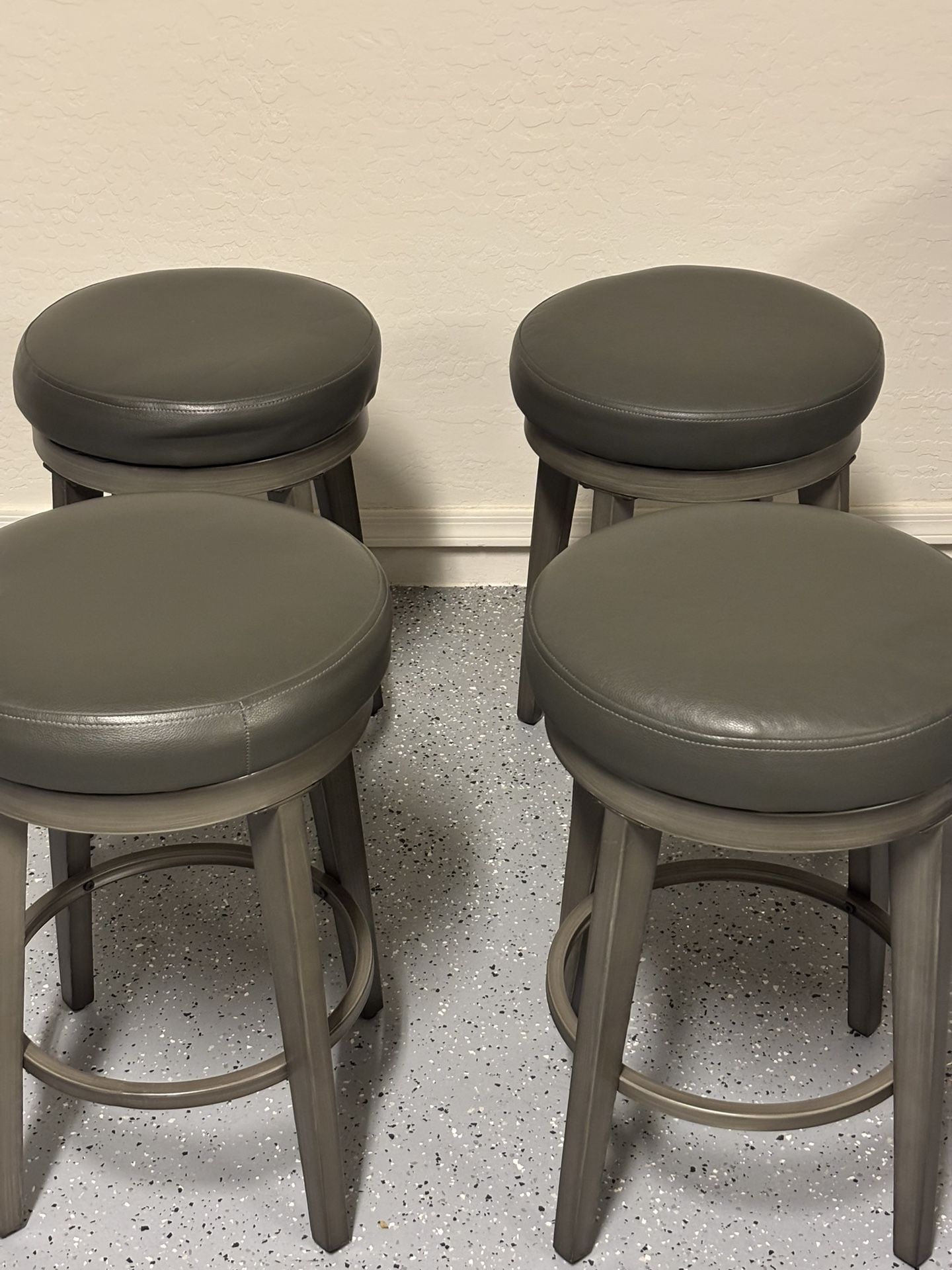 Four Counter Height Swivel Bar Stools