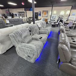 Light gray recliner sofa love seat