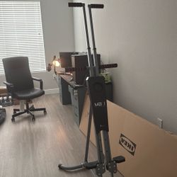 Vertical climber machine 