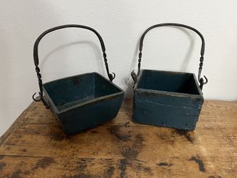 Set of teal painted baskets