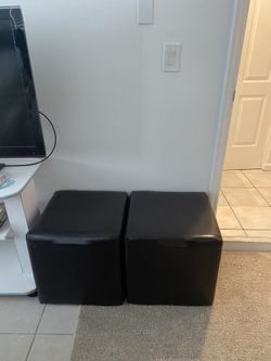 2 Faux Leather Ottomans