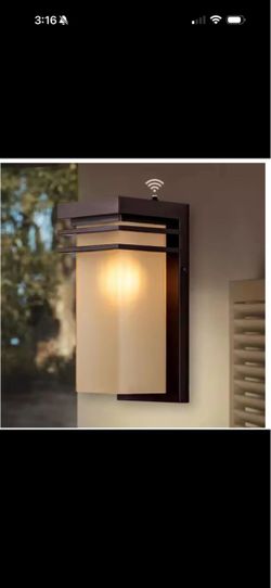 12 in. Bronze Modern Outdoor Wall Sconce with Dusk to Dawn Sensor & Amber Glass