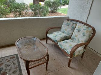 Wicker love seat and table