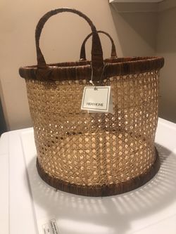 New basket with tag , paid $49 can be used for flowers pot, or blankets or toys.