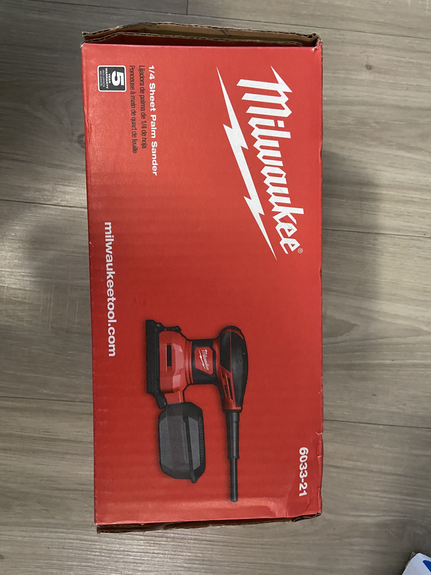 Milwaukee 1/4 Sheet Palm Sander.