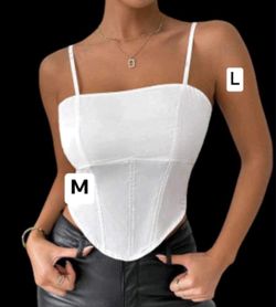 New women’s top available in size medium and large