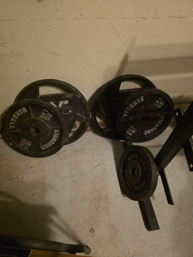 Set Of 45 Pound Plates And Set Of 35 Pound Plates