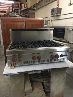 Wolf Gourmet counter top stove , 6 burners , stainless steel unit