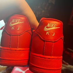 custom red air force ones with the initials “kj” on the back men’s size 9