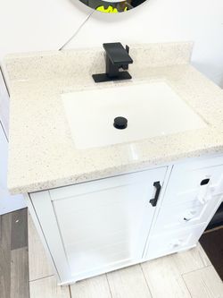 Bathroom vanity with faucet