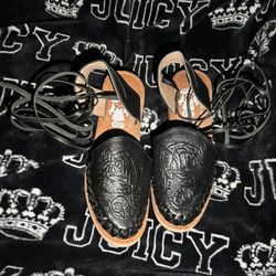 Black leather laced western style with floral design 