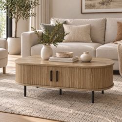 Luxenhome 23.6 in. Brown Round Wooden Coffee Table with Storage and Slatted Sliding Doors,IF1979