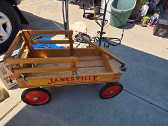 VINTAGE Janesville Ball Bearing coaster wagon constructed from solid red oak.