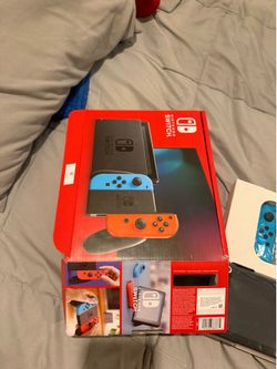 Nintendo switch brand new, never used  I bought it by mistake