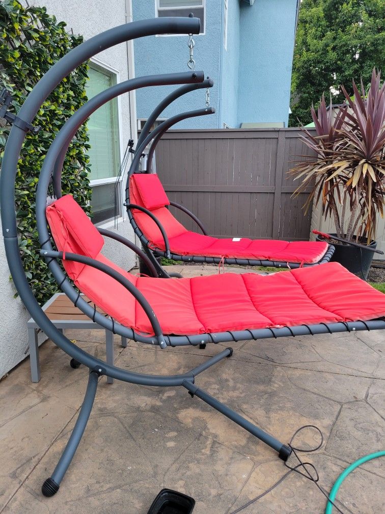 Pair of Outdoor Hanging Curved Steel Chaise Lounge Chair Swing w/Builtin Pillow for Sale in