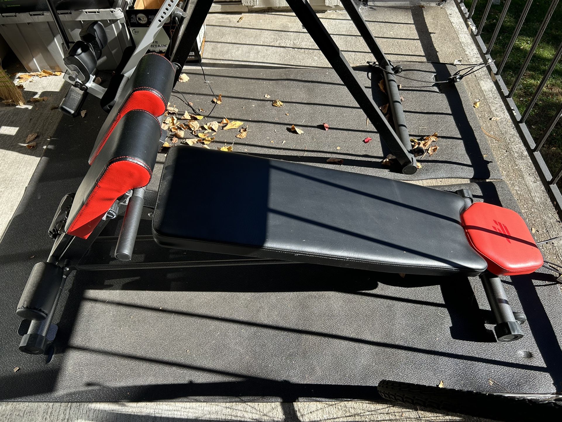 Combination back extension and weight bench