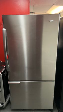 Like new Amana 22 cu.ft stainless steel³ bottom freezer one year warranty
