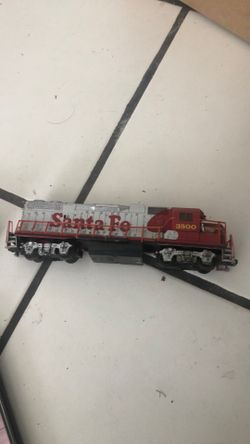 Collectors Trains! Vintage Union Pacific and Santa Fe Metal trains. Used to be used in a n electric village.