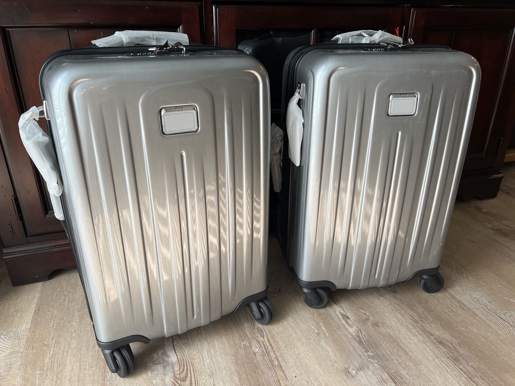 2 Brand New Tumi Carry-ons