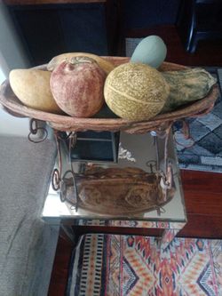 Rustic fruit vase with metal stand